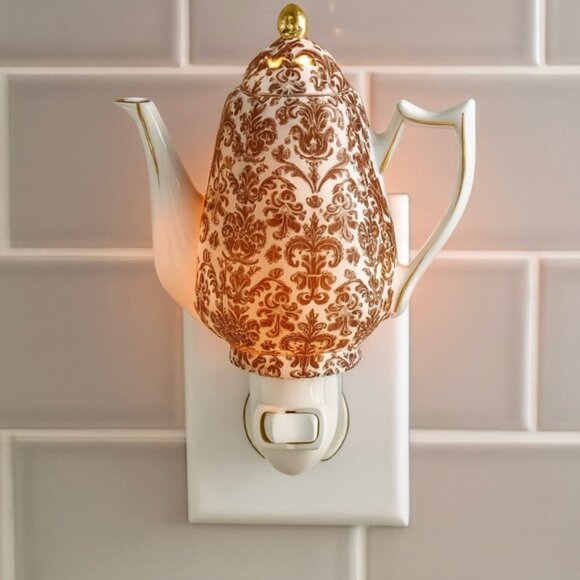 Kirkland’s Apropos Teapot Nightlight Porcelain Plug-In Lamp - Picture 1 of 4